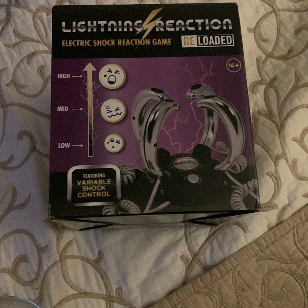 Brand new in box lighting reaction electric shock game